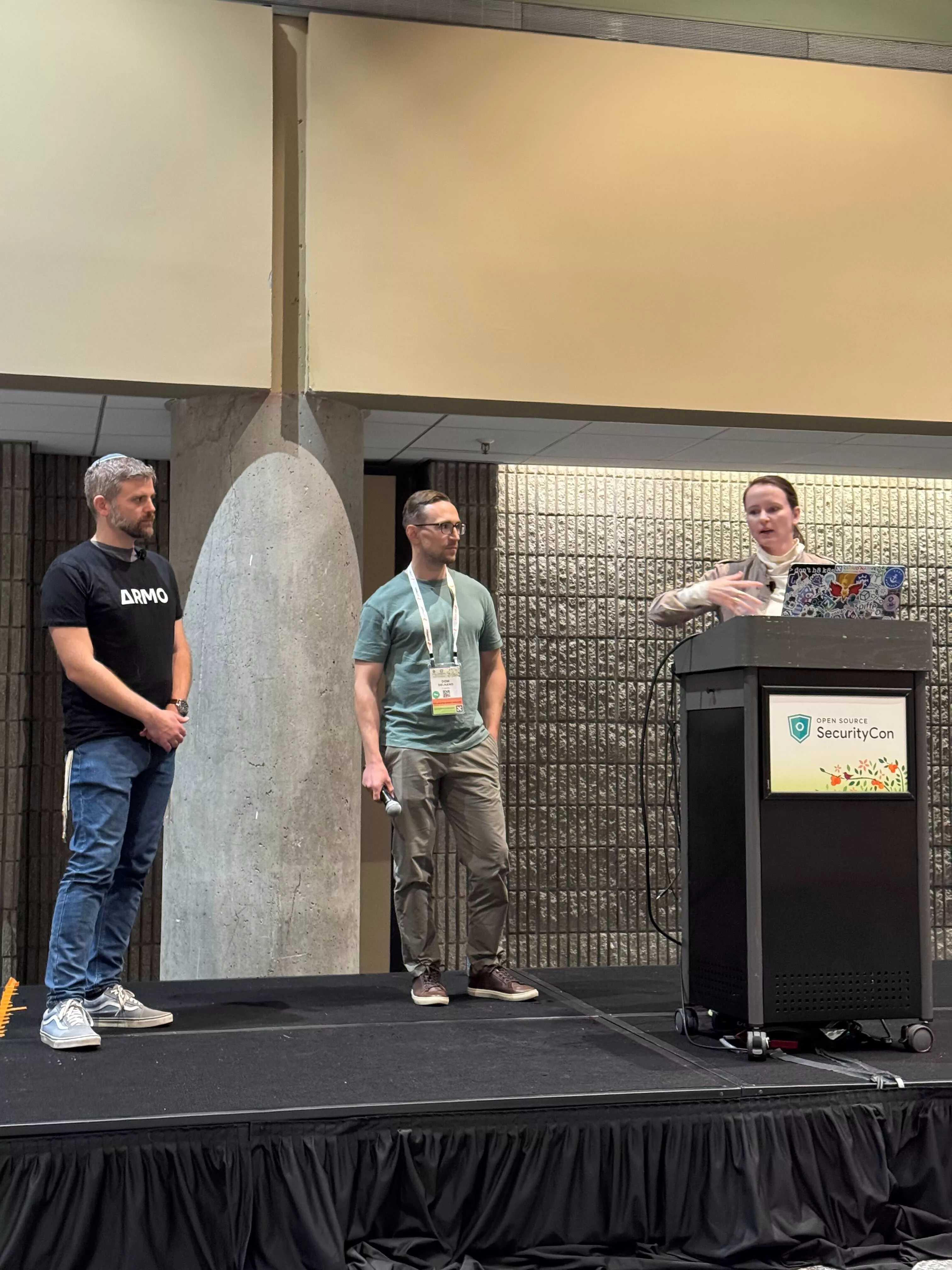 The three maintainers on stage together