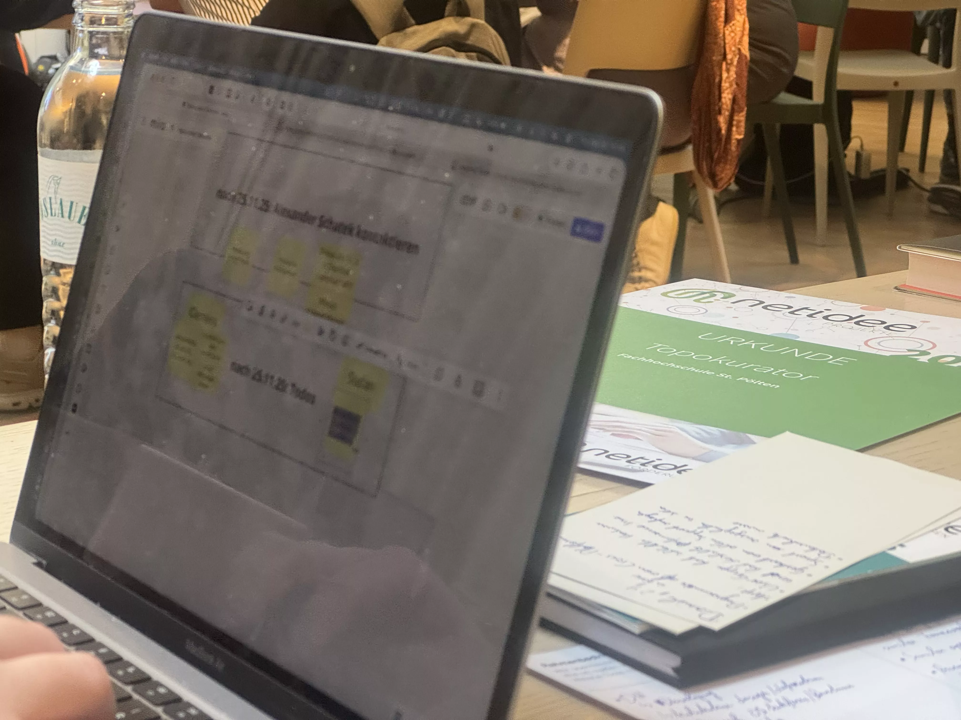 a laptop screen showing a first project draft