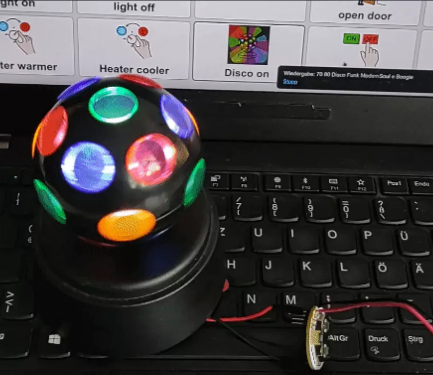 Abbildung 2: Ansteuerung eines Spielzeug-Diskolichtes über PuckJS und die neue "UART-Aktion" in AsTeRICS Grid