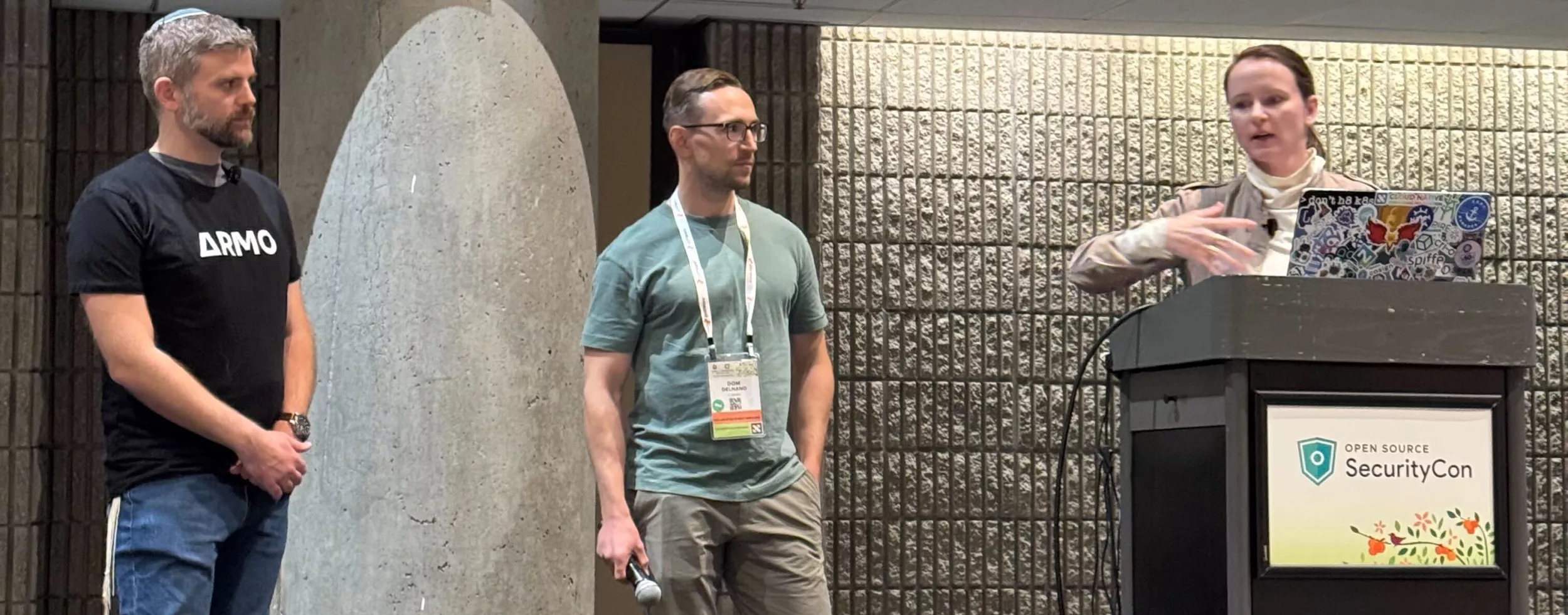 The three maintainers on stage together