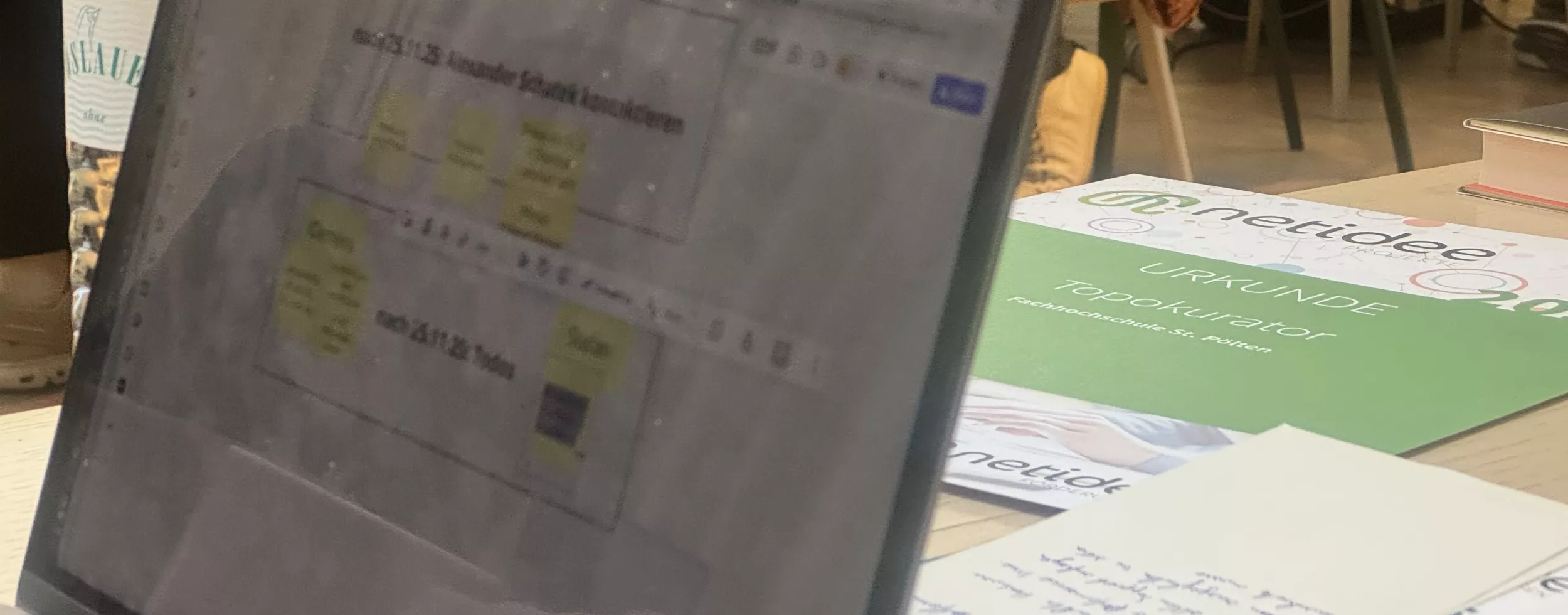 a laptop screen showing a first project draft